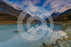 View from lake Akkem on mountain Belukha near board between Russia and Kazahstan during golden autumn