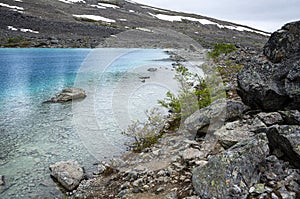 View of The Lake Blavatnet and it`s shore, Lyngen Alps, Norway