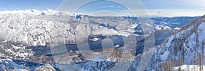 View of the Lake Bohinj and the surrounding mountains in winter.