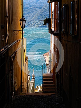 View on Lake Como through a bystreet of Varenna