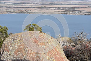 View of Lake Ellsworth over a boulder at Mt. Scott near Lawton Oklahoma.