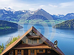 A view of the lake Lucerne or Vierwaldstaetersee and Swiss Alps from the Vitznau settlement