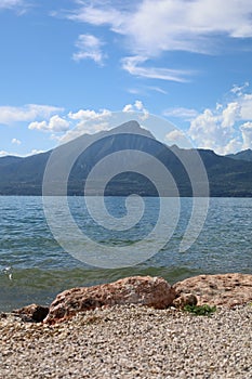 View of the lake and the mountain formation from the east side to the west side of the lake in beautiful weather with blue sky