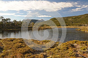 View on the lake and mountains around the southernmost trek in the world in Dientes de Navarino in Isla Navarino, Patagonia photo