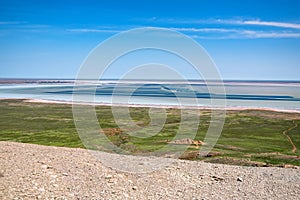 View of lake and Nizhny Baskunchak village in Astrakhan region, Russia.