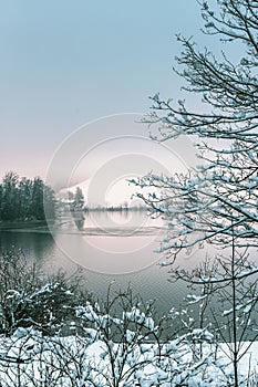 View of lake Schliersee in the Bavarian Alps in Germany on a cold winter day