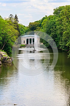 View of lake with Snake Fountain and Flora Pavilion in Sofiyivka park in Uman, Ukraine