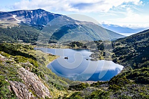 View on the lake on the southernmost trek in the world in Dientes de Navarino in Patagonia photo