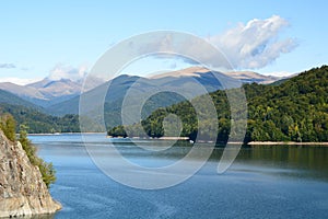 View of Lake Vidraru and Fagaras mountains. Arges county. Romania