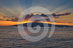 View of Lanai at sunset from Lahaina on Maui.