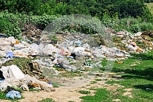 View of the landfill. Landfill A pile of plastic garbage, food waste and other garbage. Pollution of nature. A sea of garbage