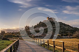 view of the landmark Arta Sanctuary on the hill in warm evening light