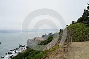 The view in Lands End, San Francisco. summer , cloud , rock , sea, plant. photo