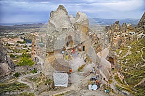 View landscape with ancient rock carved houses in Nevsehir turkish Kapadokya