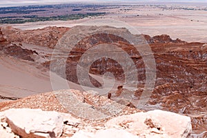 View of the landscape of the Atacama Desert. The rocks of the Mars Valley Valle de Marte and Cordillera de la Sal, Atacama photo