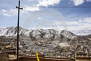 View landscape and cityscape of Leh Ladakh Village with Himalaya mountain range from viewpoint of Leh Stok Palace while winter