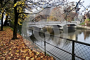 View landscape cityscape of Munich city and Kleine Isar river while fall autumn in garden public park morning time at Munich