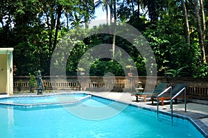 View landscape garden and lawn with swimming pools at outdoor of resort for travelers guest travel visit and relax rest at