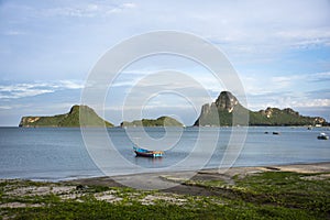 View landscape seascape and wooden fishing boat floating in sea waiting catch fish and marine life while night time in ocean of