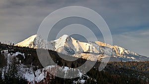 View of the landscape with snowy mountains in the background