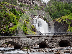 View on Langfossen waterfall in summer, Etne, Norway