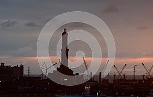 View of Lanterna, the lighthouse, at dusk. Genova. Liguria, Italy photo