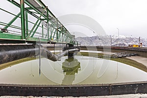 View of the large concrete thickener in the mining process factory. The driving force for the separation is gravitational.