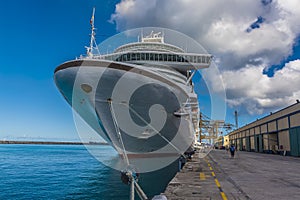A view of a large cruise ship moored in Bridgetown, Barbados