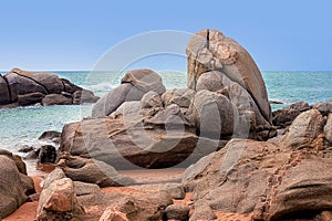 View of large rocks along the shore of the South China Sea. Sky Grottoes Park, Sanya, China