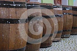 View of large wooden barrels for storing wine or other alcohol