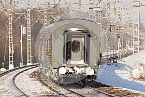 View of the last passenger car from behind the turn of the train