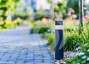 View of led lighting solar lamp in daytime in a green garden.