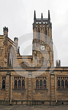 View of leeds minster with tower and architectural details from the street