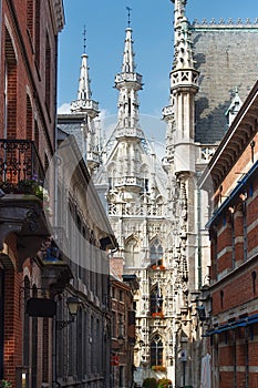 View of the Leuven City Hall from narrow Eikstraat Street.