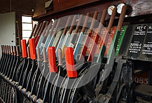 VIEW OF LEVERS ON VINTAGE SHUNTING SYSTEM IN AN OLD STATION