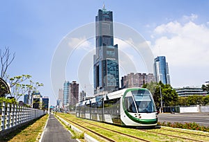 View of light rail train and the skyline in Kaohsiung, Taiwan.