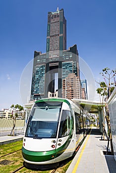 View of light rail train and the skyline in Kaohsiung, Taiwan.