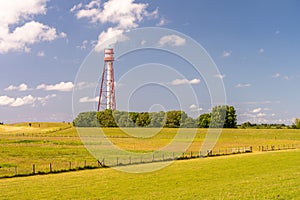 View on the lighthouse of campen near emden, north sea, germany