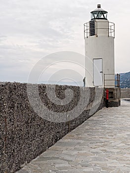 View of the lighthouse of city of Camogli, Genoa Province, Ligur