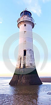 View of a lighthouse in Liverpool at sunset, United Kingdom