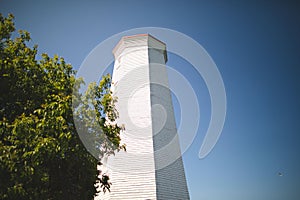 View of a lighthouse located in Presquile Provincial Park, Ontario, Canada photo