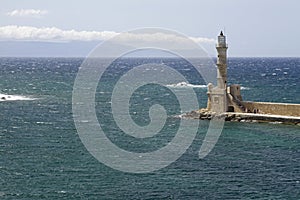 View of a lighthouse at the port of Chania, Crete on clear sky background