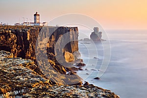 View Of Lighthouse And Sea In Peniche Portugal At Sunset