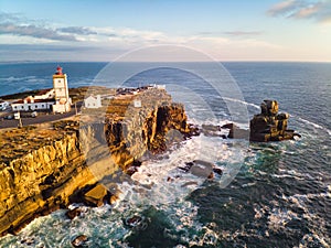 View Of Lighthouse And Sea In Peniche Portugal At Sunset