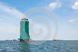 View lighthouse at Sunda Kelapa harbor, the gate to Jakarta port of Indonesia