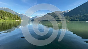 View of Lillooet Lake with mountains in the background taken from Strawberry Point Campground