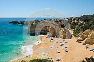 View of limestone cliffs and the Rabbit Beach Praia da Coelha in Albufeira, District Faro, Algarve, Southern Portugal