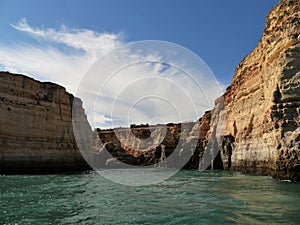 View of limestone cliffs in southern Portugal near Lagos from the Atlantic ocean