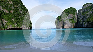 View of limestone cliffs and tropical beach at the lagoon of Maya Bay Koh Phi Phi Thailand