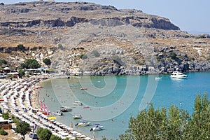 View of Lindos beach in August. Lindos, Rhodes Island, Dodecanese, Greece